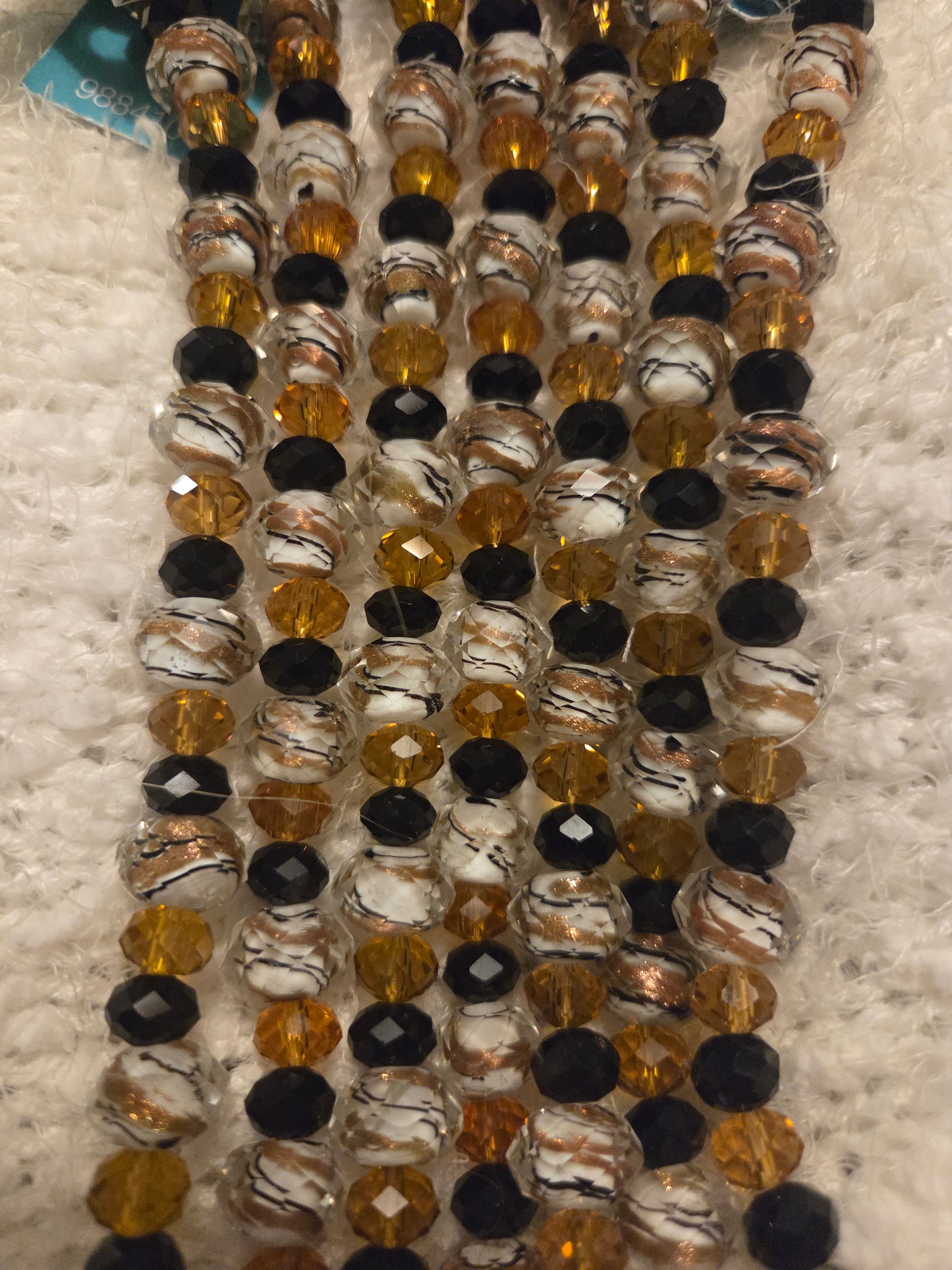 Amber Black Gold Toned Marble Beads